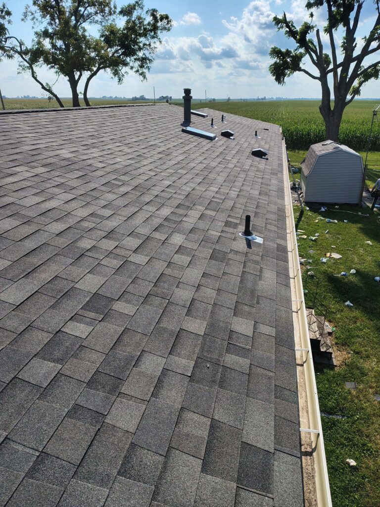 Finished shingle roof and new gutters on a Villisca, Iowa home