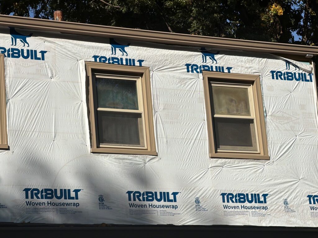 Woven house wrap installed before new siding in West Omaha