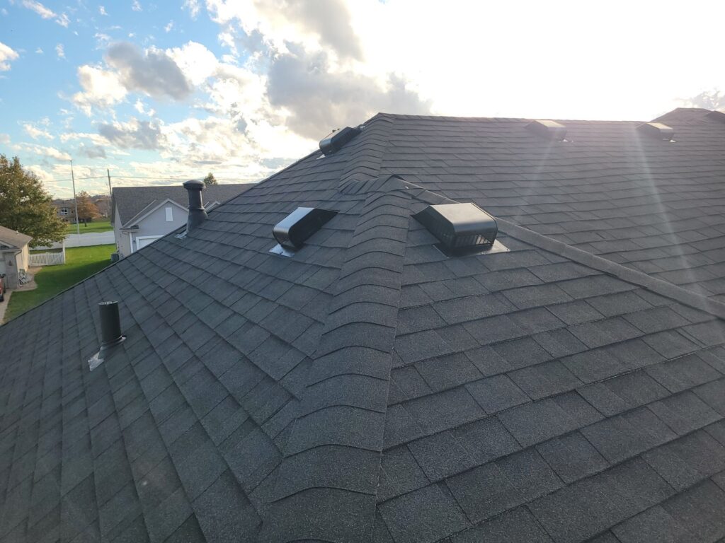 Finished Malarkey Vista AR Brilliant Black shingle roof with box vents on a Papillion, NE home